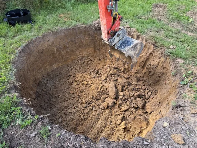Excavator preparing the ground for a treatment plant installation